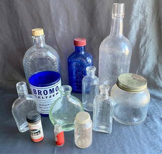 Collection of 12 Old Antique and Vintage Bottles: Collection of 12 Old Antique and Vintage Bottles. Old Quaker - Medicine Bottles - Bromo Seltzer - Milk of Magnesia - Vitamin Bottles - Etc. Assorted Sizes and Styles. Photo's are considered part of