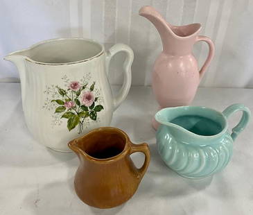 4 Vintage Milk/Creamer Pitchers: 4 Vintage Milk/Creamer Pitchers. *Hall - U.S.A - White with Rose Milk Pitcher -Apx. 5 3/4" H. *hyalyn USA - Pink Creamer - Apx. 8" H. *Franciscan Mint Green Creamer - Apx. 3 1/2"H. *Hall USA 196 -