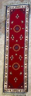 Oriental Style 8' Runner/Rug: Oriental Style 8' Runner/Rug. Some Damage on one corner as pictured. Fringe on Both Ends. Burgundy/Blue/Beige. Apx. 8 Foot long with fringe x 26 1/2" W. Photos are considered part of the description