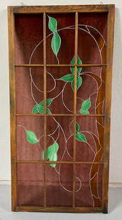 Large 56 1/2" Leaded Glass Window Panel: Large Leaded Glass Window Panel. 12 Panels with Leaf/Vine Design. Hooks on the top to Hang. There is some wood damage as pictured. Apx. 56 1/2" H x 27 1/2" W. Photos are considered part of the 