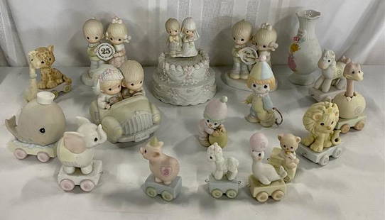 18 Pieces of Precious Moments Figures Animal Train: 18 Pieces of Precious Moments Figures. 2 Bridal - 25th Anniversary - Anniversary - Vase. 2 Clowns - 11 Animals on Train Wheels. Photos are considered part of the description and condition.