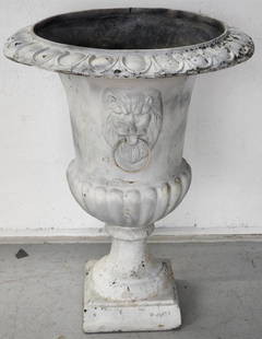 Fiberglass Urn/Planter w/ Lions Head Handles: Fiberglass Urn/Planter. With Lions Head Handles - Metal Rings. Apx. 24" H Paint is Worn. Photos are considered part of the description and condition.