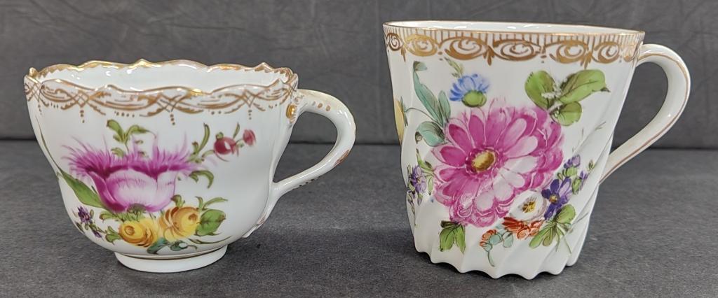 2 Dresden Tea Cups: 2 Dresden Tea Cups. *Floral Tea Cup with Swirl and Gold Trim Apx. 2 1/2" H. *Tea Cup with Pink and Yellow Flowers Apx. 2" H. Photos are considered part of the description and condition.