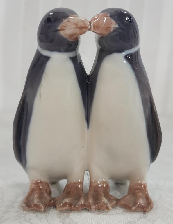 Royal Copenhagen Porcelain Penguin Pair: Royal Copenhagen Porcelain Penguin Pair. Denmark. Apx. 4" H. Photo's are considered part of the description and condition.