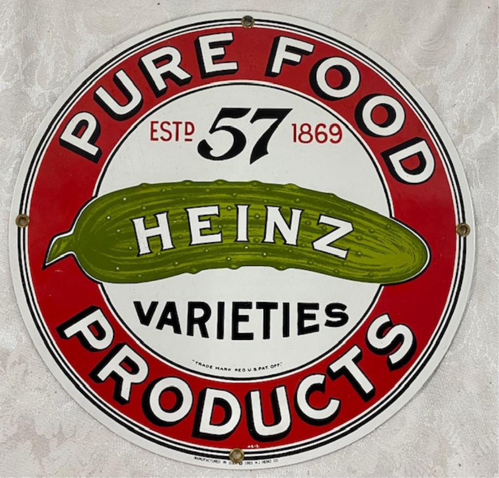 1983 Andy Rooney Enamel Heinz Sign: 1983 Andy Rooney Enameled Heinz Sign. Heinz Pure Food. 1983 H.J. Heinz Co - Reproduction. Apx. 11 1/4" Diameter. Photo's are considered part of the description and condition.