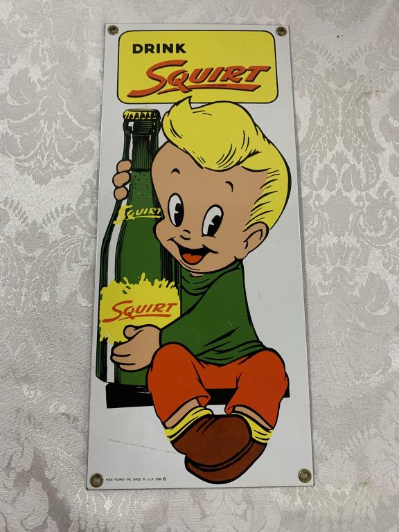 Andy Rooney "Drink Squirt" Enamel Sign 1986: Andy Rooney "Drink Squirt" Enamel Sign Made in USA 1986. Apx. 14" H x 6" W. Some surface scratches. Photo's are considered part of the description and condition. 200