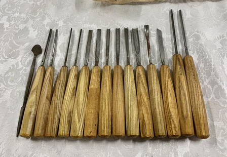 15 Assorted Wood Carving Tools: 15 Assorted Wood Carving Tools. Some Marked Swiss Made. With Canvas Rolled Carrier. One does not have a wood handle. Photo's are considered part of the description and condition.