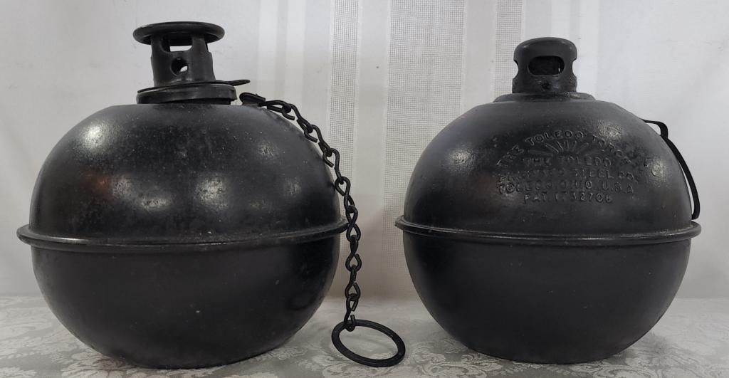 2 Vintage Smudge Pots: 2 Vintage Smudge Pots. Road Flare Construction Markers. *Toledo Torch. *Dietz Torch. Apx. 8 1/2" H. Photo's are considered part of the description and condition.