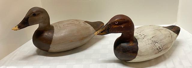 2 Duck Decoys Signed-R.J. Clante: 2 Duck Decoys Signed R.J. Clante Orland, Me Plante- Burned into bottom of both. R.J. Clante was an award winning decoy carver - Passed away on 04-01-2022. Both Decoys have damage on the duck bills/bea