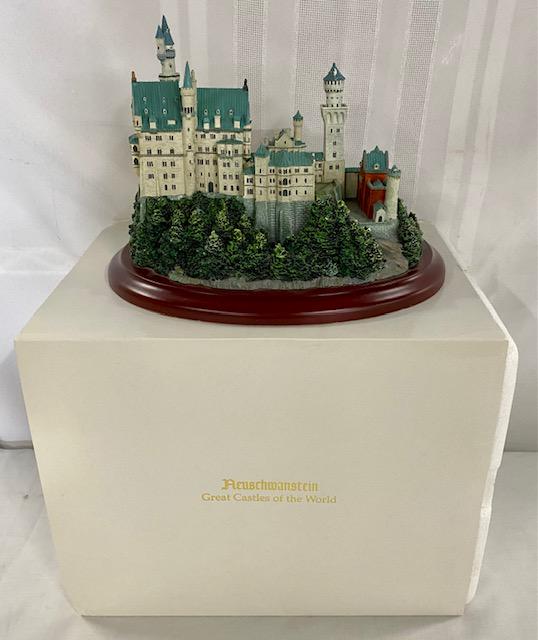 1994 Lenox Neuschwanstein Castle Figure: 1994 Lenox Neuschwanstein Castle Figure. Great Castles of the World. With Original Box. Box shows some wear. Apx. 9" L x 7 1/4" H x 7 1/2" W. Photo's are considered part of the description and conditi