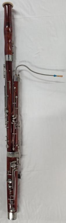 Hard Maple Bassoon: Hard Maple Bassoon. 3 Pieces. Some scratches on the wood. Apx. 52 1/2" L. Photo's are considered part of the description and condition.