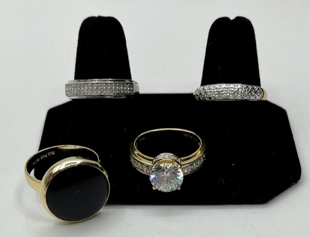 4 Nice Sterling Rings - Some with Diamonds: 4 Nice Sterling Rings. *Smokey Quartz Cabachon 18k over Sterling Marked 925 FAS - Size 9. *Gold Tone Band Diamond Accents - Size 9 1/4 - Marked DL 925. *Silver Tone Band with Diamonds- Marked SJ 925 -