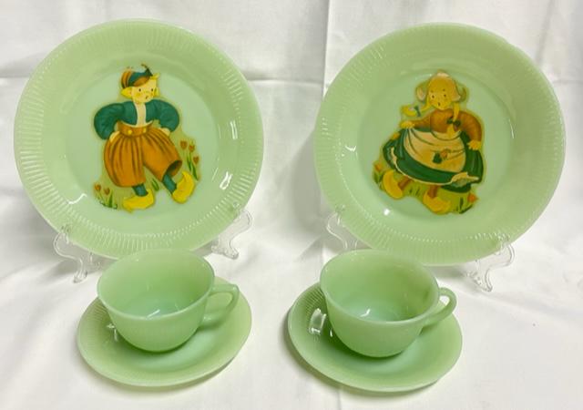 6 Pieces of Jadeite Dinnerware: 6 Pieces of Jadeite Dinnerware. 2 Cups. 2 Saucers. 2 Plates - 9" with Dutch Girl and Boy Stencils. Photo's are considered part of the description and condition. O
