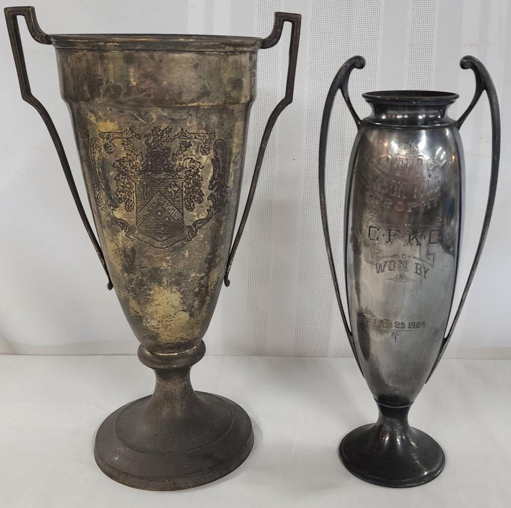 2 Antique Silver Plate Trophy Vases: 2 Antique Silver Plate Trophy Vases. *The Dickson Ives Co. - 1924 - by Wilcox S.P. Co. Apx. 11 3/4" H. *Silver Plate Vase with Coat of Arms - Apx. 13"H. Photos are considered part of the description a