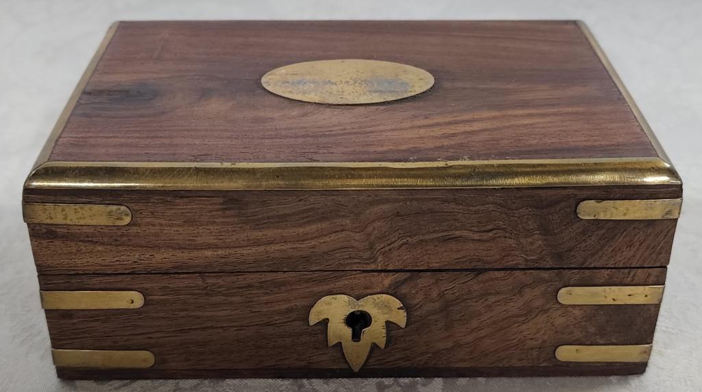 Wood Box with Brass Decoration: Wood Box with Brass Decoration. Handicraft - Made in India. Red Felt Interior. Apx. 2 1/2" H x 6" L x 4" W. Photos are considered part of the description and condition.