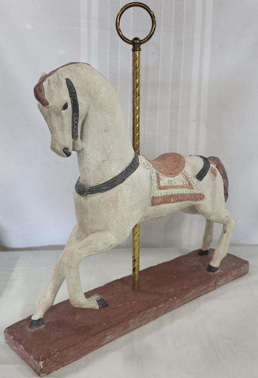 Austin Productions 1981Carousel Horse Sculpture: Austin Productions 1981 Carousel Horse Sculpture. Hair line crack on front leg. Paint chip on back leg. 20"H X 19"L X 4 1/2 "W. Photos are considered part of the description and condition