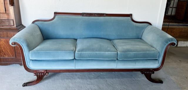 7 Foot Duncan Phyfe Sofa: 7 foot Duncan Phyfe sofa, - Vintage carved mahogany frame. - Brass claw feet. - Blue velvet with arm covers. - Very nice condition. Photos are considered part of the description and condition.