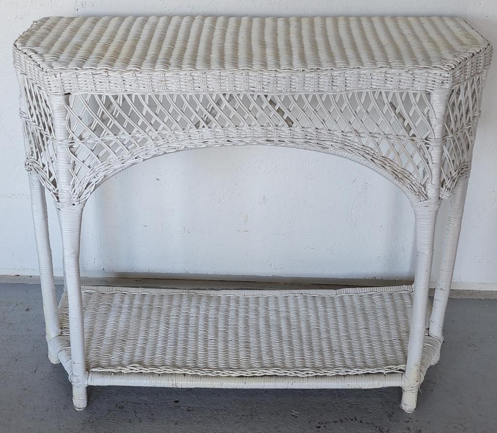 Antique White Wicker Table: Antique white wicker table. Approx. 31"H X 36"L X 14"W. Photos are considered part of description and condition. 505-16