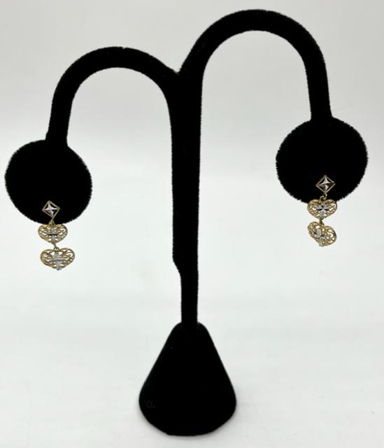 10k Dangle Heart and Cross Design Earrings - 1.1g: 10k - 2 tone Dangle earrings with yellow gold filigree hearts and white gold crosses in center. 1.1g. Approx. 2/3". Photos are considered part of the description and condition.