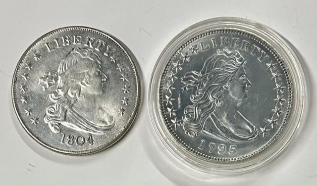 1795 & 1804 Liberty Coin Replicas: 1795 Coin in plastic protective case. These are not real coins. They are copies. Photos are considered part of the description and condition. 804-19