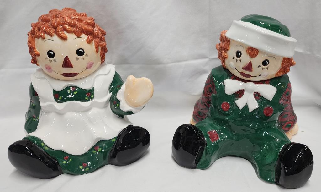 Raggedy Ann and Andy Cookie Jars: Raggedy Ann and Andy cookie jars. - Sakura China 1998. - crazing line on Ann. - as shown in pictures. - approx. 12"H. Photo's are considered part of the description and condition.