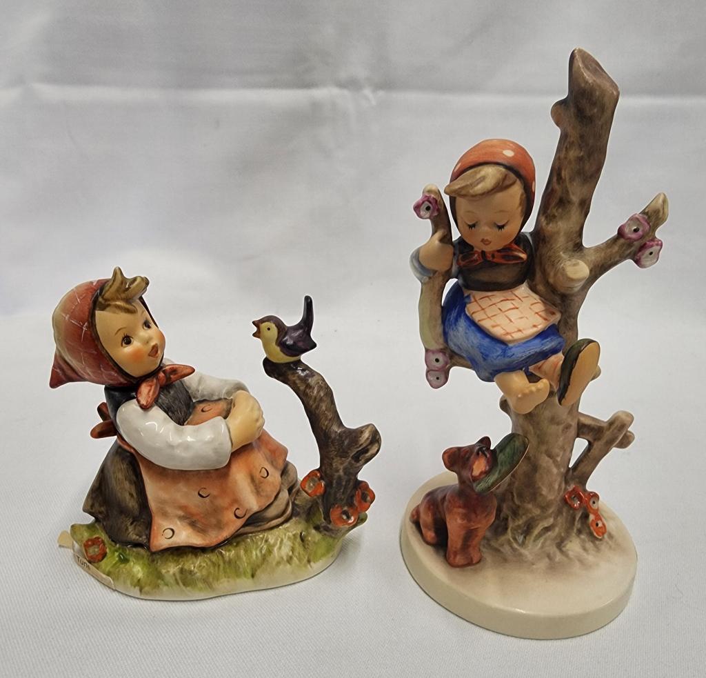 2 Collectable Hummels: 2 collectable Hummels. * Out Of Danger - #56. - approx. 6 1/4"H X 3 1/4"W. - Goebel logo on bottom. * " In Tune" - # 414. approx. 3.5"W X 4 1/4"H. - Goebel logo on bottom. No apparent cracks or chips.