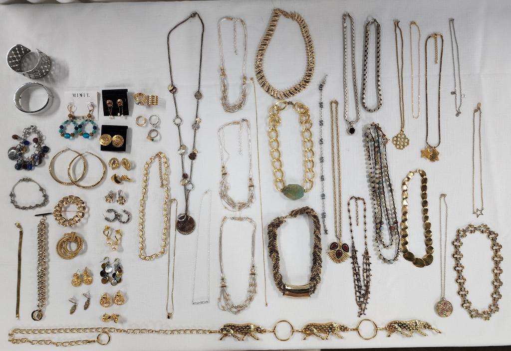 Nice Assortment of Costume Jewelry: Nice assortment of costume jewelry. Mostly gold and silver tones. Bracelets, earrings, brooches, belt, necklaces. Photos are considered part of the description and condition.
