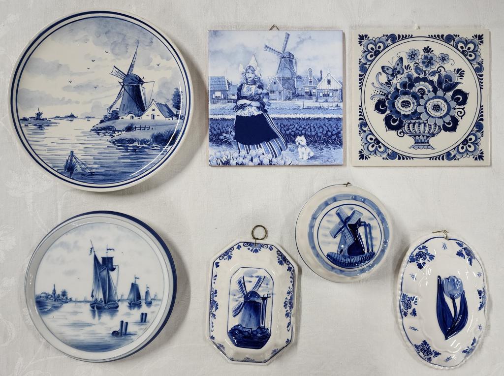 Collection of Delft Wall Hanging Plates and More: Collection of Delft wall hanging plates and more. * hand painted Delft blue wall hanging plates and molds - 1 mold has a chip in it - as shown in pictures. * 2 blue and white wall hanging trivets. Siz