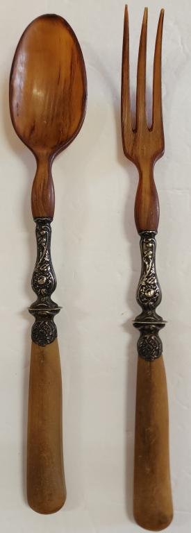 Antique Bone (?) and Sterling Salad Set: Antique bone (?) and sterling salad set. - serving fork and spoon. - approx. 11"H. Spoon has a raised sliver as seen in photos. Photos are considered part of description and condition.