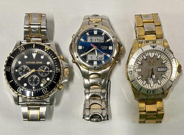 Invicta, Michael Kors, & Citizen Men's Watches: 3 Designer men's watches. - Invicta. Gold-tone. Mother of pearl face. Automatic diver's 200m. - Michael Kors. Silver-tone with Gold-tone accents in band and black/gold bezel. - Citizen WR50. silver-to