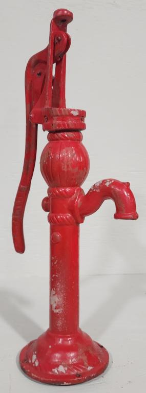 Antique Style Iron Water Pump: Antique style cast iron well/water hand pump. Some paint peeling. 20"H. Photos are considered part of the description and condition.