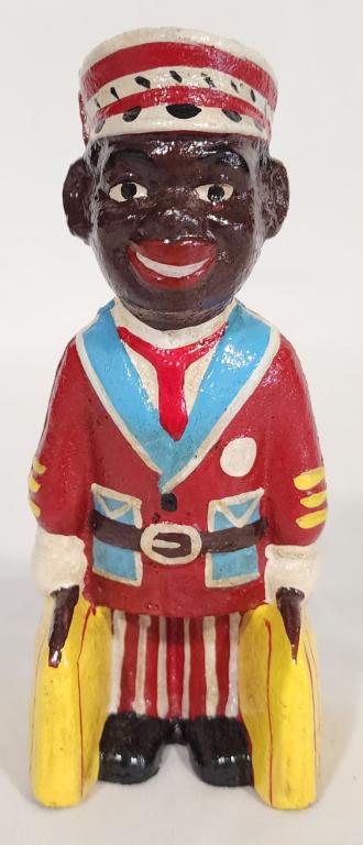 Cast Iron Black Americana Bell Hop Coin Bank: Cast Iron Black Americana Bell Hop Coin Bank. Approx. 5.75"H. Reproduction. Photos Are Considered Part Of The Condition And Description.