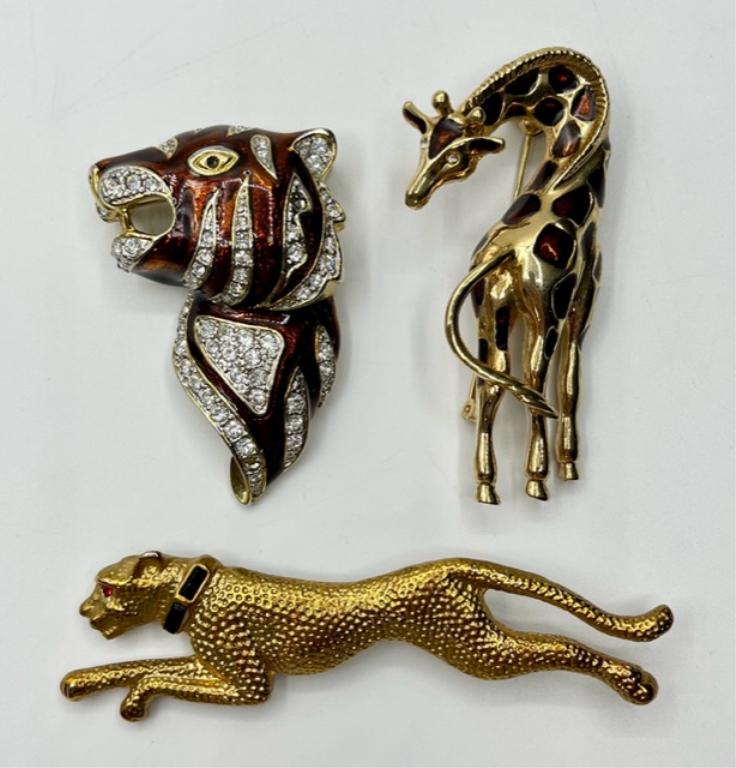 3 Beautiful Animal Brooches: 3 Beautiful Animal Brooches. *Jaguar/Big Cat Textured Gold-Tone with Black Enamel Collar & Red Rhinestone Crystal Eye Pinback Brooch. Approx. 3 3/8"L x 1"H. *Tiger/Cat Brown Enamel on Gold-Tone with R