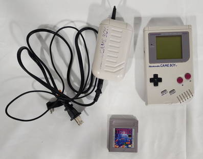 Vintage Nintendo Game Boy: Vintage Nintendo Game Boy. Hand Held System. Model DMG-01 1989. Comes with: *Tetris. Rechargeable Battery Pack. Model DMG-03US. Works. Photo's Are Considered Part Of The Description And Condition. 215