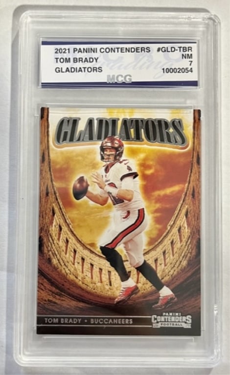 Graded Tom Brady Collectors Card: Graded Tom Brady Collectors Card. In protective sleeve. Photos Are Considered Part Of The Description And Condition. 101.
