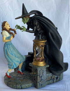 Franklin Mint Wizard of Oz "Dorothy's Final Hour": Franklin Mint "Dorothy's Final Hour" Figurine. Turner Entertainment Co. 1997. Working Hourglass. Missing decorative ring on left pillar holding hourglass as seen in photos. Overall figurine is in very