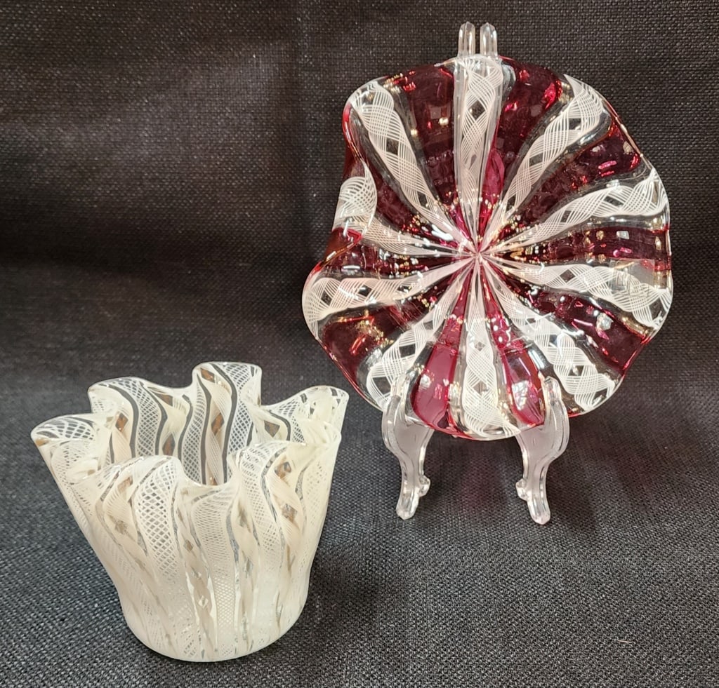 Murano Art Glass Ribbon Dish and Vase: Murano art glass ribbon dish and vase. Red and white ribbon dish. Approx. 6.5"W. Latticinio handkerchief vase. Approx. 3.5"H. Photos are considered part of the description and condition.