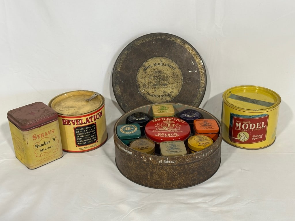 Collection of Vintage Tobacco Tins: Collection of Vintage Tins. *John Middleton's Blending Kit. *Revelation Smoking Tobacco. Approx. 4.5"H x 5.5" Diameter. *Model Smoking Tobacco. Approx. 4.5"H x 5.5" Diameter. *Strauss Number 9 Mixture