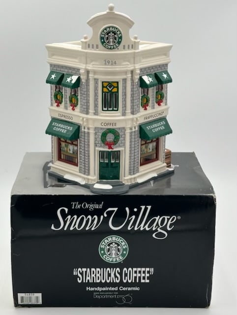 Dept. 56 "Starbucks Coffee" Snow Village Piece: Department 56 "Starbucks Coffee" snow village piece. Approx. 9.75"H. With original box. Photos are considered part of the description and condition.