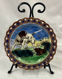 Wedgwood Majolica Hunt Scene Cabinet Plate: Wedgwood majolica hunt scene cabinet plate. Approx. 9.25". A few places where glaze is chipped on back. Stand not included. Photos are considered part of the description and condition. R