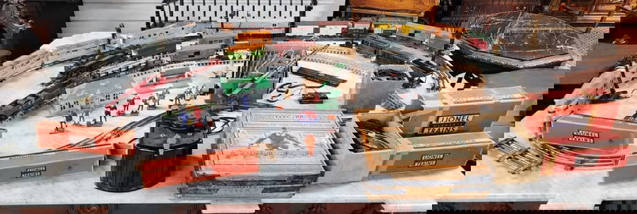 Large Collection Lionel & American Flyer Trains: Large collection of Lionel and American Flyer train cars and accessories. Wood and metal tracks. Some original boxes. One Lionel and 1 American Flyer transformers. Photos are considered part of the de