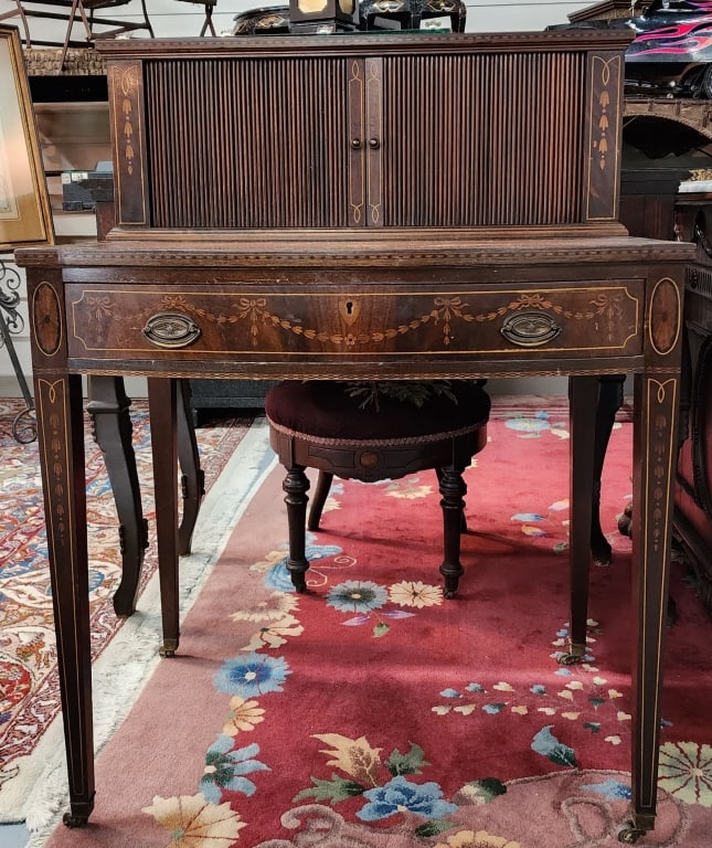 Mahogany Federal Style Tambour Leather Top Desk: Antique federal style tambour mahogany leather top desk. Leather is worn. Approx. 40"H x 29.5"W x 22"D. Photos are considered part of the description and condition.
