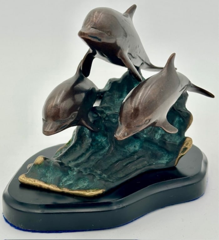 Brass 3 Dolphins on a Wave Sculpture: Brass 3 Dolphins on a Wave Sculptures. Approx. 6"H x 7"W x 5"D. Photos Are Considered Part Of The Description And Condition. 505-31