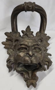 Large Cast Iron Green Man/Lion Plaque: Large Cast Iron Green Man/Lion Plaque. 3 Dimensional Wall Hanging or Door Knocker - missing knocker. Approx. 15"H x 11"W x 9"D. Photos Are Considered Part Of The Description And Condition.