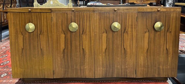 Mid Century Gilbert Rhode for Herman Miller Paldao Sideboard: Mid Century Gilbert Rhode for Herman Miller Paldao sideboard. 4 Doors with large brass pulls. Center and left side have 4 shallow pull out drawers. Right side has single shelf. 3 Pull out tray extensi