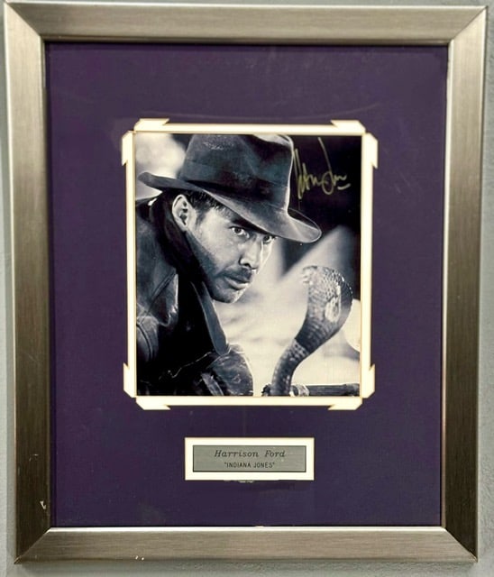 Signed & Framed Harrison Ford Photo: Signed & Framed Harrison Ford Indiana Jones Photo wit COA. Picture Has Not Been Examined Out Of Frame. Approx. 19"H x 16"W Photos Are Considered Part Of The Description And Condition.