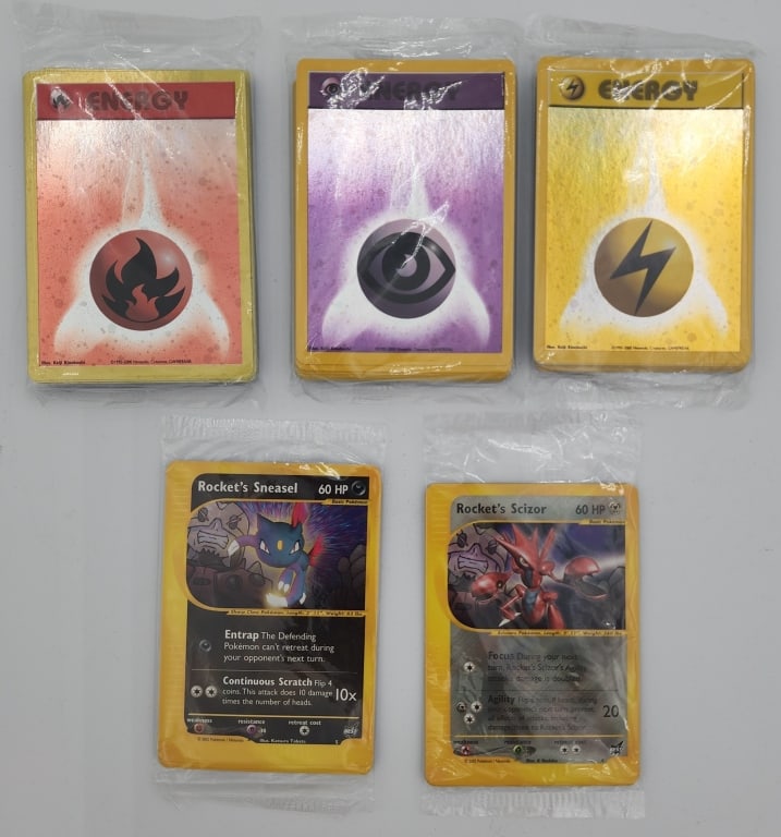 Assortment of Nintendo Pokemon Collectors Cards: Assortment of Nintendo Pokemon Collectors Cards. Never Opened. 3 Assorted Packs of Energy Cards - unsure of how many cards are in each pack. Each Face Cards Contains 8. Photos Are Considered Part Of T
