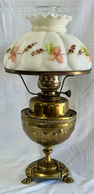 Antique Matador Oil Lamp w/ Hand Painted Shade: Antique Matador Oil Lamp with Hand Painted Floral Shade and Ornate Claw Feet Base. Approx. 12"W. Photos Are Considered Part Of The Description And Condition.