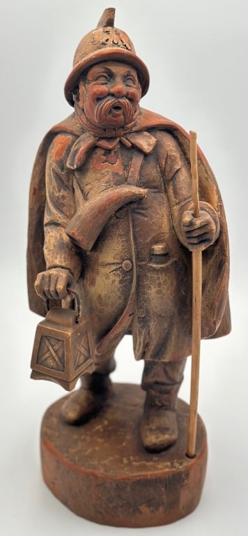 Hand Carved Night Watchman Wood Figure: Hand Carved Night Watchman Figure. Approx. 16"H. In good condition. Walking Stick appears to me missing a piece, possibly a hook or lantern. Photos Are Considered Part Of The Description And Condition