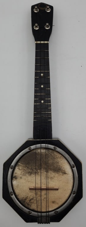 Vintage Bell Brand 4 String Octagon Banjo: Vintage Bell Brand 4 String Octagon banjo. Approx. 21"L. Photos Are Considered Part Of The Description And Condition. R.